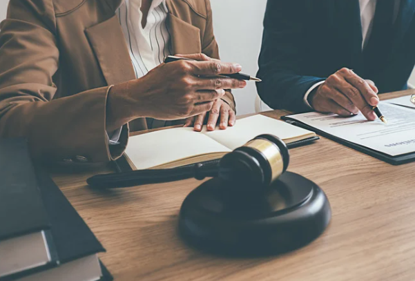 Meeting between Los Angeles disability lawyers and judge discussing legal case