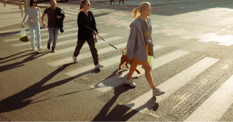Pedestrians walking on the sidewalk in LA.