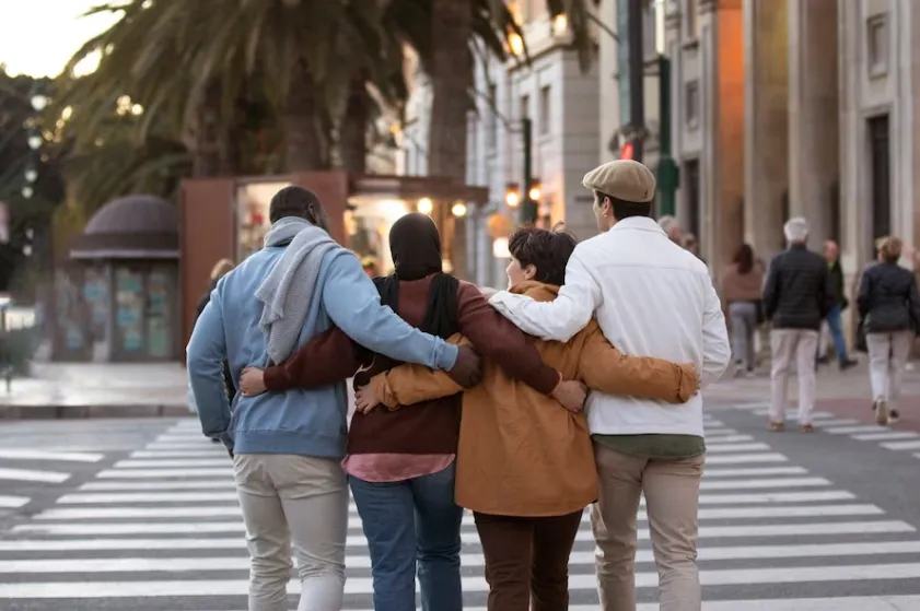 happy people walking together after successful legal representation