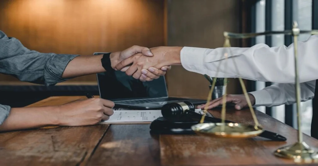 calabasas personal injury lawyer shaking hands, legal consultation