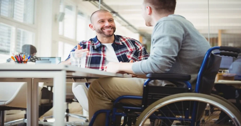 disability manhattan beach services and advice. lawyer and man in wheelchair