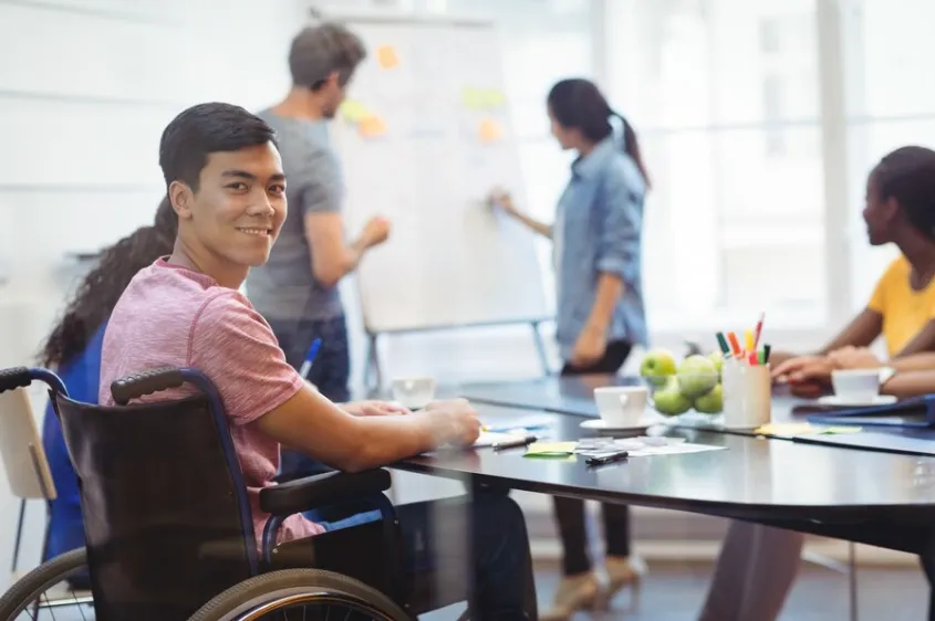 Legal advice and disability services in West Hollywood for a man in a wheelchair.