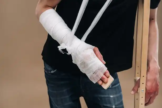 Injured Man with Cast and Crutches - Moorpark Injury Lawyer